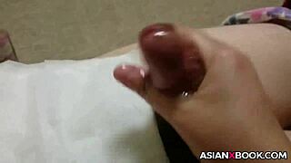 In a homemade setting, an Asian babe skillfully uses chopsticks for an intense handjob session with her amateur partner.