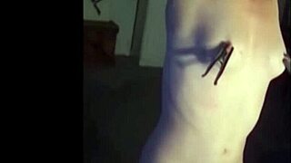 Whipping submissive punished with lashes in bdsm session evokes deep emotional surrender