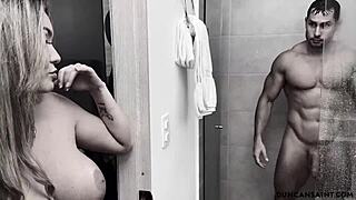 She caught the muscular bodybuilder bathing in the shower