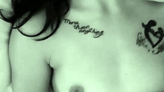 amateur solo performer joins couple for intimate play in tattooed setting