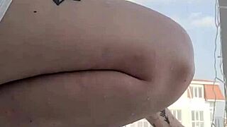 A fiery redhead explores the bustling city, her vibrant hair turning heads everywhere.