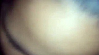 The eater DEVOURS a massive feast in the crowded diner, savoring every bite with intense focus.