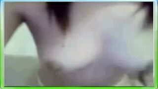 The beautiful college girl with natural big tits is studying.