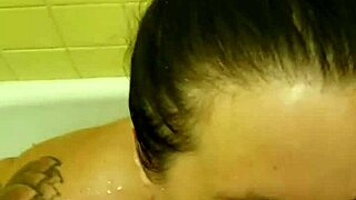 This piss slut dives into golden shower action with wild enthusiasm! 😈💦