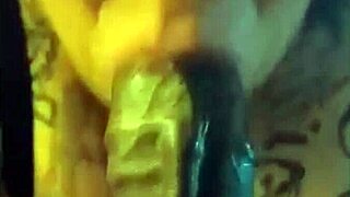 A plump BBW eagerly sucks a massive black cock in the bedroom.