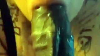 A plump BBW eagerly sucks a massive black cock in the bedroom.