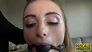 In this BDSM scene, the submissive babe gags on his dick before riding him hard.