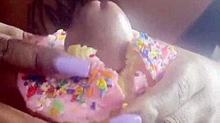She gives a sloppy blowjob with a donut on his monster cock