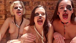 Three drooling topless sluts sit outside, tongues out in spit fetish.