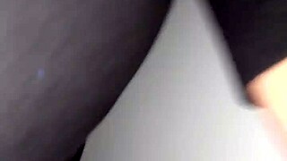 Stephanie Smith chats at the gloryhole in an adult theatre setting