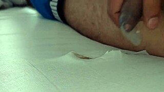 two guys get wild on a mattress, pounding hard in a steamy gay encounter