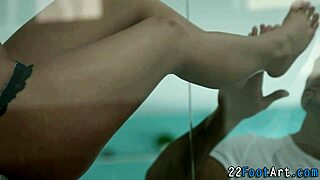 The hottie gives a kinky footjob leading to cumshot