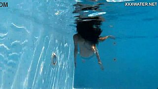 hungarian babe relaxes in poolside bikini swim