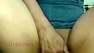 Young woman indulges in solo pleasure with eager touches