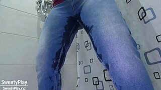 A woman in desperate need wets her jeans