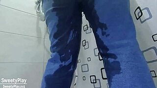 A woman in desperate need wets her jeans