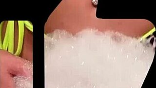 Brenda strips in the bathtub after bikini fun 😏