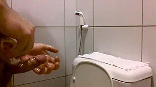 overwhelmed by oiled handjob stroking cock to explosive cumshot