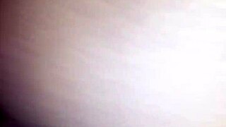 Black And White Footage Captures A Wet Scene On April 24, 2016, At 12:07 Pm