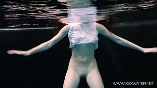 Andrejka boldly strips naked for a public pool bath