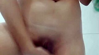 Latina beauty bathes sensually while pleasuring herself in the shower