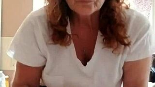 Mature Milf Puts Lotion On Her Sexy Skin!