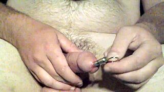 toy play with cock sounding leads to cum in close up.