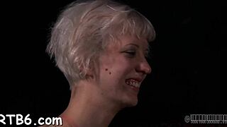 in this bondage scene, she gets seduced into doggystyle with ball licking and sloppy blowjob