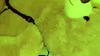 Wife rides teddy bear's strap on