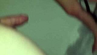 a girl performs a deepthroat on a big cock