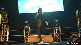 busty german milf gives steamy lapdance on public stage