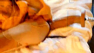 guy uses machine to fuck his ass in gay scene.