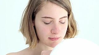 Hey there, watch this young looner babe blow and pop her first balloon!