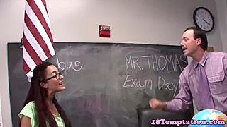 Hey, watch this redhead stepteen jerk her teacher in class!