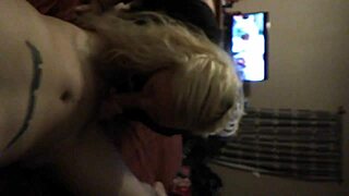 tiny blonde girl playing with toys at home