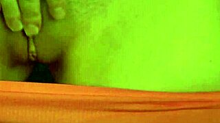 Amateur With Big Tits Strips In Pink Fishnets Showing Shaved Pussy Close Up