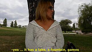 blonde girl shows her small tits and shaved pussy outdoors for money