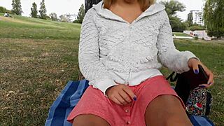 blonde girl shows her small tits and shaved pussy outdoors for money