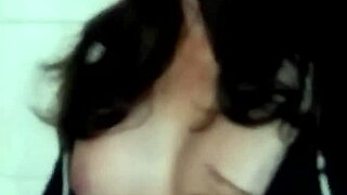 brunette milf smokes cigarette topless outdoors