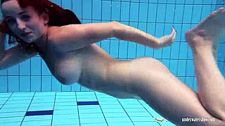 I’m Mesmerized Watching Redheaded Katrin Strip Underwater in the Pool
