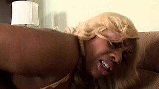 Beautiful black couple intensely fucks bareback on couch, ripping clothes for orgasm.