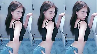 sexy chinese girl dances with vibrator making her pussy horny