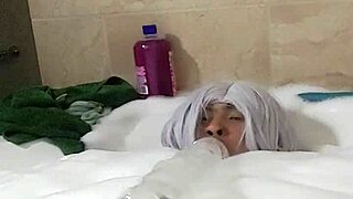 cyno enjoys solo bubble bath fun in costume play