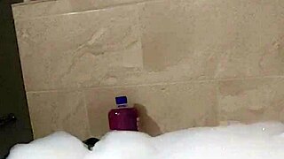 cyno enjoys solo bubble bath fun in costume play