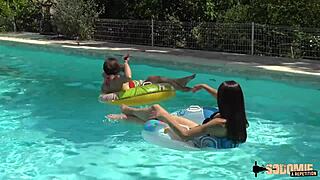 marie and candie relaxing by the pool