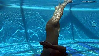 irina russia displays her figure underwater in the pool