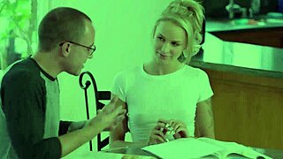 A blonde teen experiences a doggystyle threesome fuck in this group scene