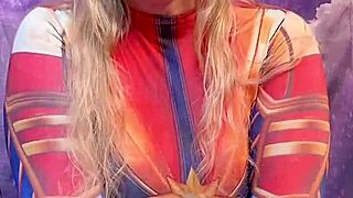 Captain marvel fiercely rides huge ebony dildo in cosplay.