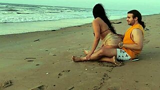 Intense sex on a public beach