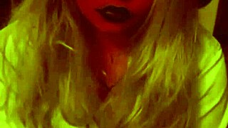 devil costume girl gives gloved handjob